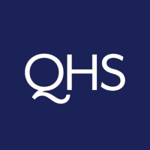 QHS logo featuring stylized white letters "QHS" on a dark blue background.